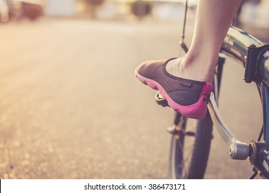 Person Cycling In The Park