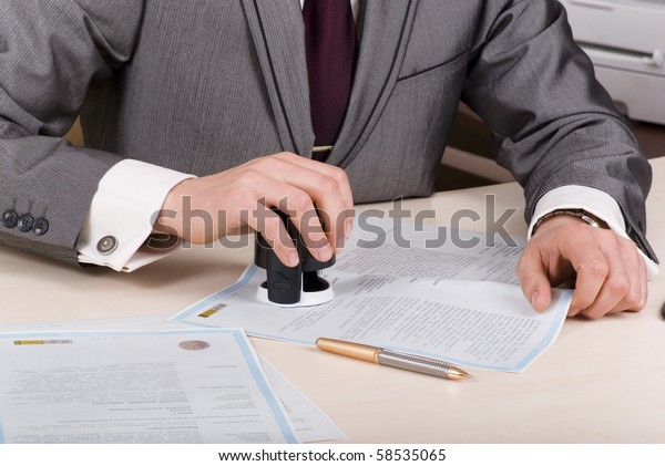 Person Desk Using Stamp Corporate Seal Stock Photo Edit Now 58535065