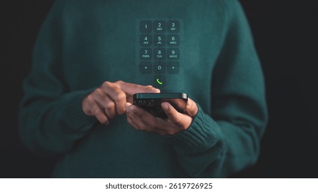 Person dialing on a smartphone with a futuristic virtual keypad interface hovering, symbolizing advanced communication. Concept of digital security and data protection on mobile devices. - Powered by Shutterstock - Get 15% off with code: PIKWIZARD15