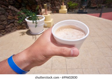 Person Drinking A Cup Of Coffee In First-person Perspective