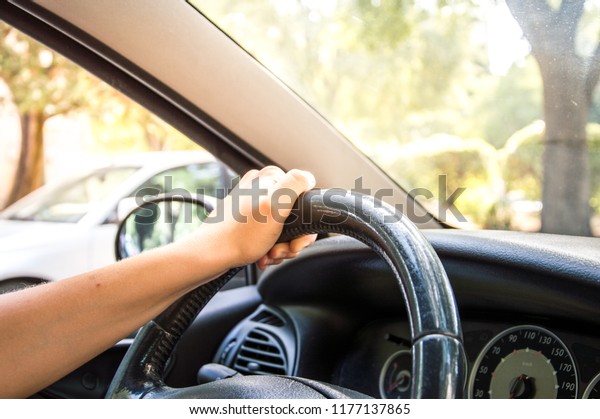 Person driving a\
car