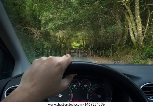 person driving down\
a mysterious little road