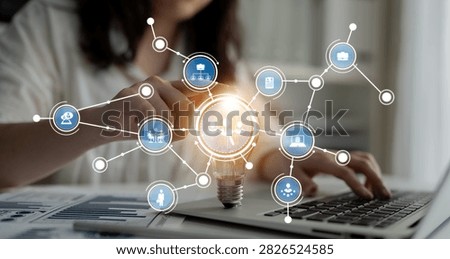 A person engages in idea generation using technology, illustrated by a light bulb icon and connected nodes, highlighting creativity and collaboration in a digital workspace. Crux