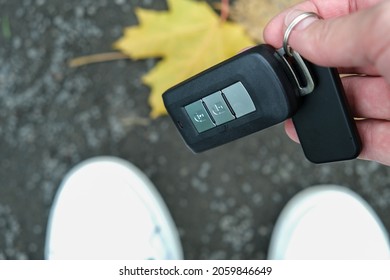 A Person Found And Picked Up From The Ground Lost Car Auto Keys.