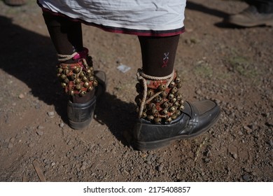  A person with Ghungroo on their feet while dancing the Indian fun fair.."selective focus" " shallow depth of field" " follow focus' " blur".