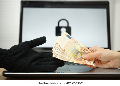 person is giving money to computer hacker to decrypt files, computer ransomware concept - Shutterstock ID 401964952