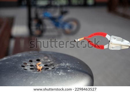 Similar – Image, Stock Photo Person with Grabber Reacher Tool