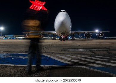 Person Guiding An Atlas Air Boeing 747 At Night Viracopos Campinas Airport, Sao Paulo, Brasil 2021