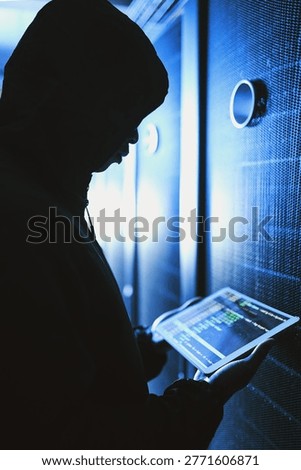 Person, hacker and tablet screen in server room at night for coding, cyberattack and data breach. Suspicious, criminal and digital with code script for hacking system, firewall bypass and espionage