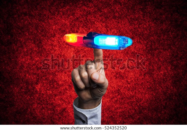 Person hand with his\
finger police car sign