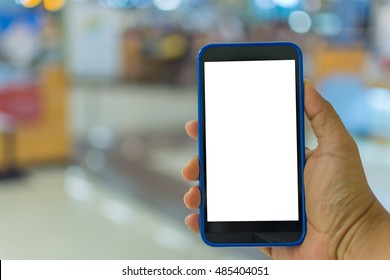 Person Hand Holding Smartphone Or Mobile Phone With White Screen Using In Supermarket For Shopping