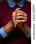 Person, hands and rosary beads for Christian prayer or God worship for Jesus trust, faith or religious. Cross, jewellery and church praise for mercy support or heaven help for healing, guide or hope