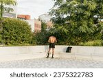 A person having a break while doing sports at Hudson River Park at the West side of New York City, United States.