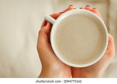 Person Holding Cup Of Coffee