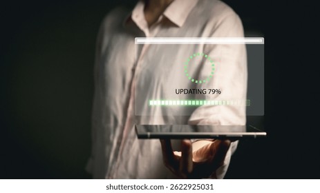Person holding digital tablet with holographic interface showing system update progress bar and circular loading animation indicating software upgrade - Powered by Shutterstock - Get 15% off with code: PIKWIZARD15