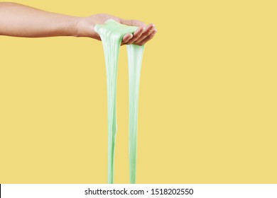 Person Holding Diy Slime Toy Dripping Form Her Hand