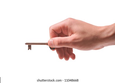 Person holding a door key isolated on white - Powered by Shutterstock