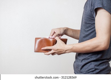 Person Holding An Empty Wallet