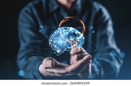 A person holding a glowing digital brain with neural network graphics, futuristic style, on a dark blurred background. Concept of innovation and intelligence
