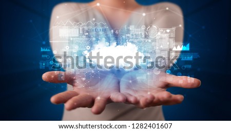 Person holding hologram screen displaying information from cloud based system