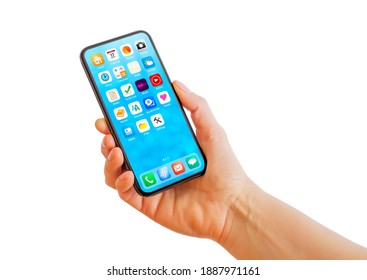 Person holding phone in hand, home screen mockup with app icons - Shutterstock ID 1887971161
