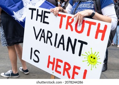 Person Holding Protest Placard Against Vaccine Mandates, Covid At Martin Place, Sydney Australia On 20 Nov 2021. Few Other People Can Be Seen Partially As Part Of The Crowd.