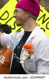 A Person Holding A Protest Sign At The March For Science In Austin, Texas On Saturday April 22, 2017.