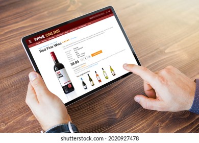 Person holding tablet and buying wine online - Powered by Shutterstock