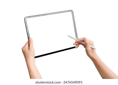 A person is holding a tablet and a pen, possibly writing or drawing on it. Concept of creativity and productivity, as the person is using the tablet - Powered by Shutterstock