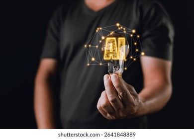 A person holds a glowing lightbulb with digital connections and the text AI inside, symbolizing idea, innovation, and creative technology powered by artificial intelligence and neural networks.