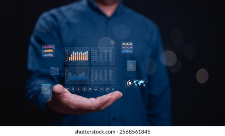 Person holds holographic display of various data graphs and charts, illustrating complexity and depth of modern data visualization techniques used in analytics and business intelligence
