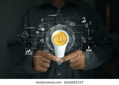 A person holds a lightbulb containing a Bitcoin, surrounded by digital icons, illustrating innovation in financial technology