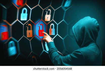 Person in a hoodie is hacking computer networks security. Cyber criminal concept. - Powered by Shutterstock