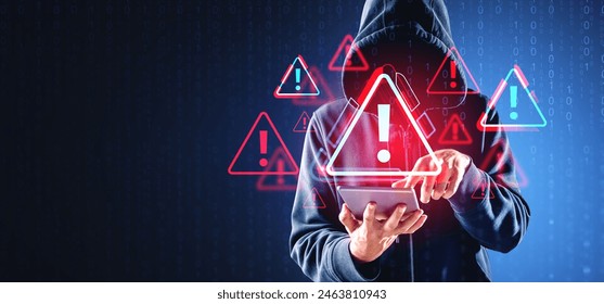 A person in a hoodie using a tablet, with warning symbols and binary code on a dark background. Concept of cybersecurity