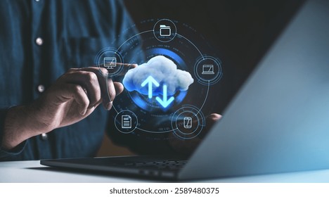 Person interacting with cloud storage interface, digital icons surrounding a glowing cloud symbol with arrows. Modern online data transfer and remote access