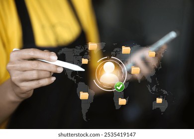 A person interacting with a digital interface represents the management of user data or identity. A central user profile icon with a check mark next to it represents confirmation or approval