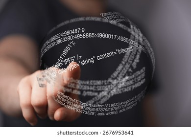 Person Interacting with a Digital Sphere of Code