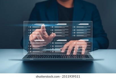 Person interacting with futuristic virtual holographic interface on a laptop, showcasing modern technology and digital data visualization.
