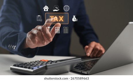 A person interacts with a digital interface displaying tax-related icons while using a laptop and calculator.