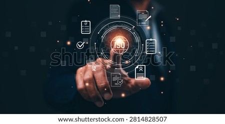 A person interacts with a futuristic digital interface displaying various document icons and a central 