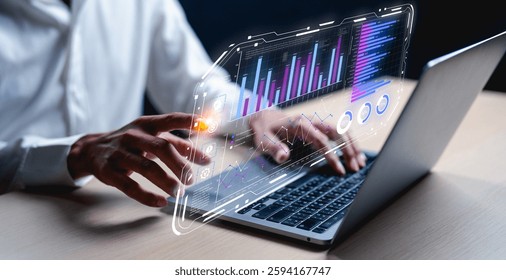 A person interacts with a laptop displaying vibrant graphs and data, symbolizing modern technology and analytics in a professional setting.