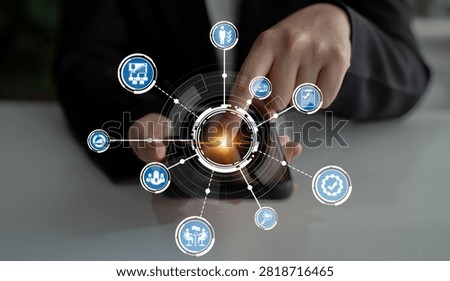 A person interacts with a mobile device showcasing various digital icons, representing modern business technology, data-driven decision making, and communication solutions. Crux