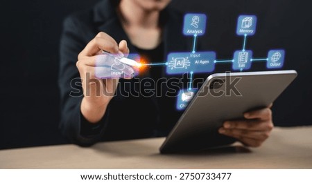A person interacts with a tablet, using a digital pen to highlight AI system components like input, analysis, memory, and output in a futuristic interface.