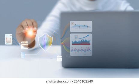 A person interacts with a virtual data security interface showing charts and protected databases. Concept of cybersecurity, data protection, and secure analytics in the digital world.