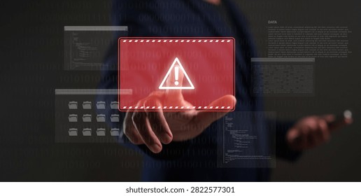 A person interacts with a virtual interface displaying a digital warning symbol and code, highlighting cybersecurity and data protection concerns.