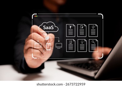 A person interacts with a virtual interface showcasing SaaS solutions and document management on a laptop in a dark setting.