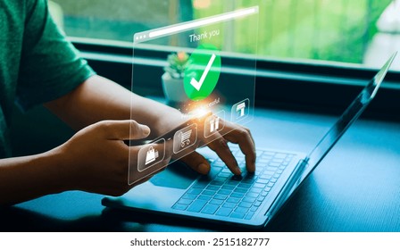 Person Making Online Payment with Credit Card on Laptop, Holographic Interface Showing Payment Successful and Shopping Icons, Representing E-commerce and Digital Transactions - Powered by Shutterstock