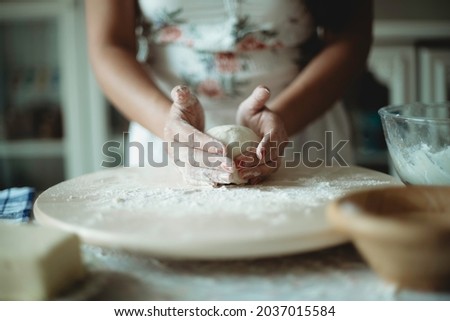 Similar – Foto Bild Frau beim Kneten von handwerklichem Brot auf Holztisch