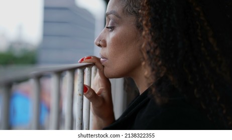 Person Observing The Street Outside From Home Balcony A Black Woman Spying Looking Out