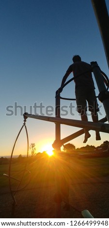 Similar – lovely little girl on a children’s slide